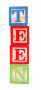 alphabet blocks, stacked on top of each other, spell the word teen