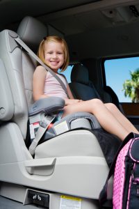 Girl Riding in Booster Seat
