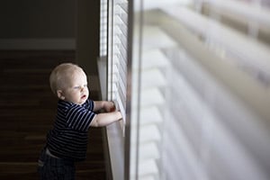 Baby near blinds